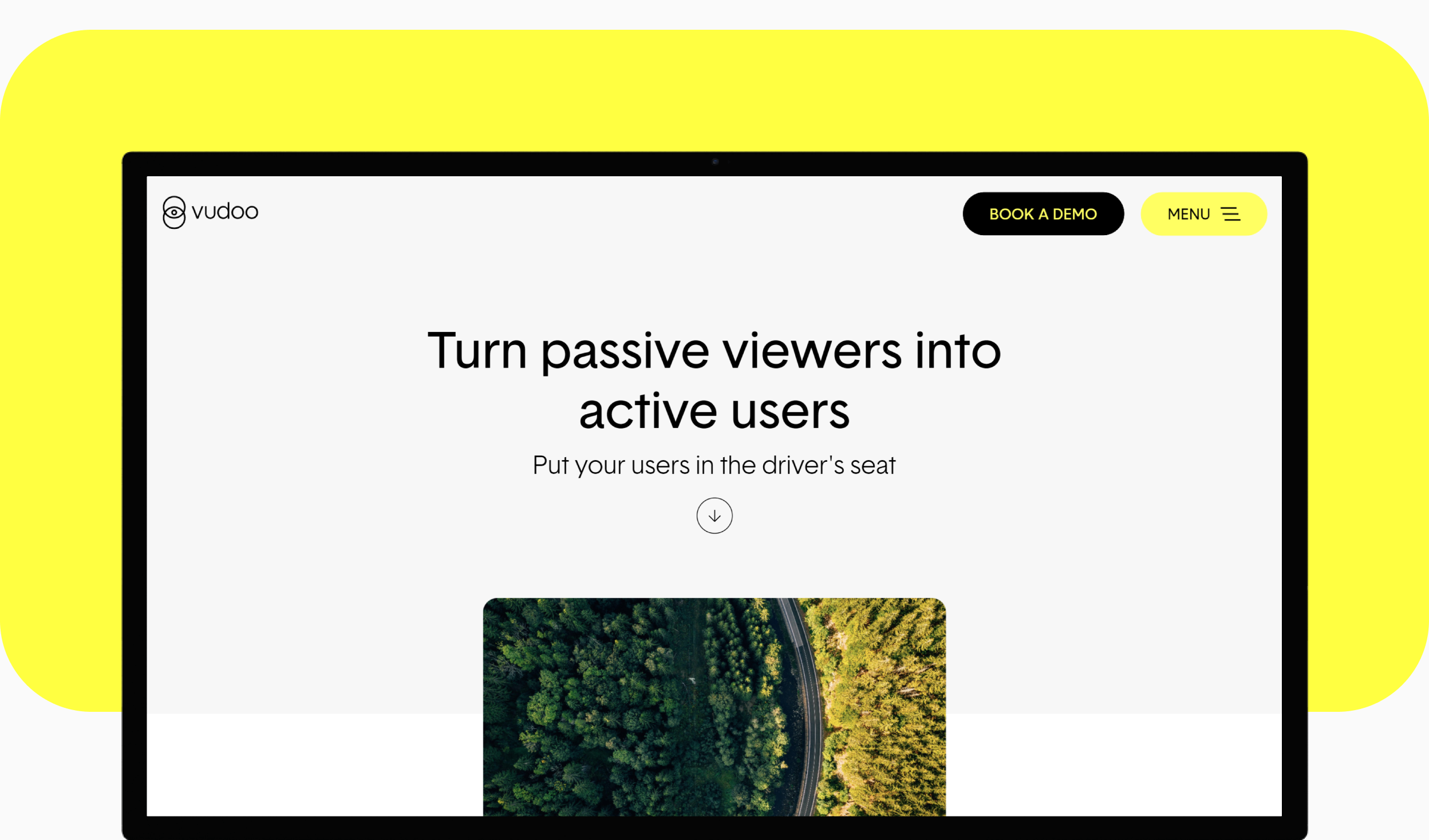 Vudoo website on a desktop screen against a yellow background